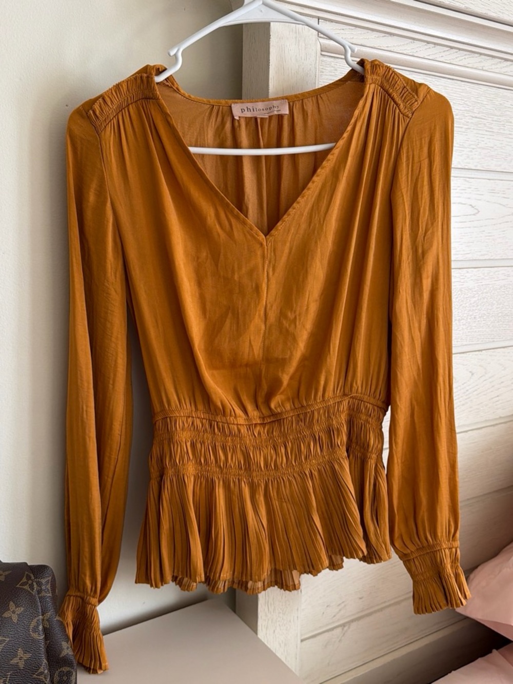 Philosophy Amber-Brown Long Sleeve V-Neck Smocked Peplum Top